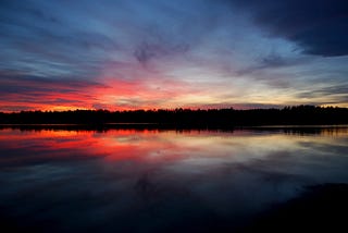 Sunset on a lake in New England.