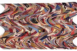 A “crazy quilt” of many colors with oddly shaped pieces. The original picture was donated to the public domain by the Metropolitan Museum of Art: https://commons.wikimedia.org/wiki/File:Quilt_Top,_Crazy_pattern_MET_DT202.jpg