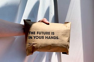 A paper-package with the text “The Future is in your hands”