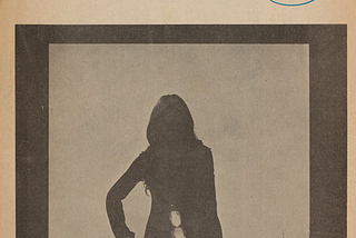 Front cover of a zine with a silhouette of a long haired woman