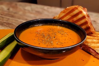 A Croque Monsieur with Tomato-Pepper Bisque, cooked by the author on a dreary day.