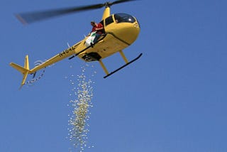 Ping-Pong balls being dropped out of a helicopter.