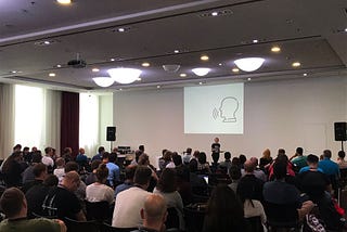 Casie presenting at DevOps Con in Berlin, June 2019