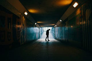 lonely man in an underpass