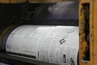 Multi-sided market collapse in the newspaper industry