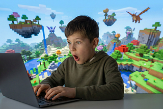 a boy surprised as he looks at his laptop; a video game scene fills the background of the image