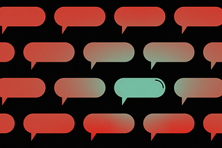 Multple red speech bubbles on black background with one green speech bubble standing out in the center