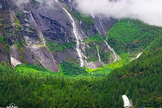 Sailing into a Sacred Chamber of Waterfalls