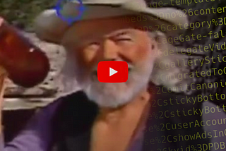 A YouTube embed of a man holding a bottle. There is HTML code over the top of the embed.