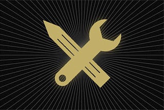 A graphic of a pencil and wrench crossed over a black background.