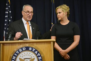 Why Chuck Schumer Should Sit Down and Give Cousin Amy the Podium.