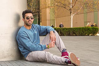 Dancer Aakash Phulwani sitting outside