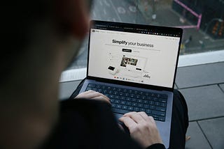 Viewing the SumUp website on a laptop, highlighting tools for small businesses, including payment systems and financial management solutions. Photo by SumUp on Unsplash