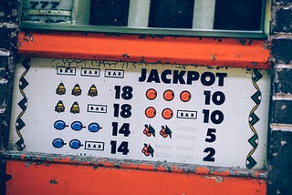 an antique jackpot slot console