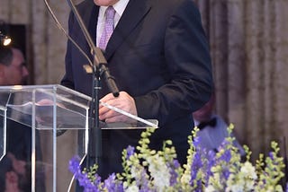 Image of Dr Pierides speaking at an event