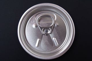 Cans, Bottles, and Social Inertia in Environmental Regulation