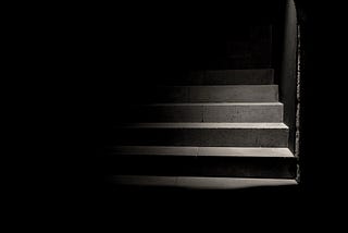 Shadowy stairs leading to an unknown destination