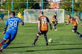 people playing football