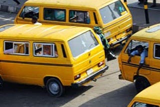 A yellow minibus that carries passengers for a fare as part of an informal transport system in Lagos, the most populous city in Nigeria. Also called faragon