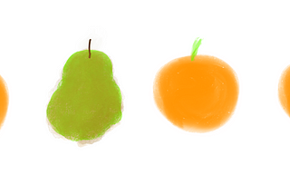 They showed me a picture of three oranges and a pear.