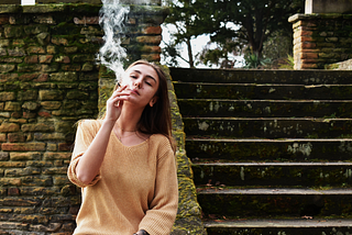 Woman smoking.