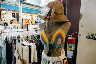 Colorful swimwear displayed in a shop.