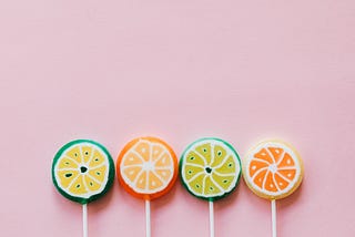 Four colorful lollipops