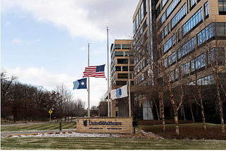 Photo of the United Healthcare Headquarters in Minnetonka, MN, with the flags at half mast, after their CEO, Brian Thompson, was shot in New York City on December 4.