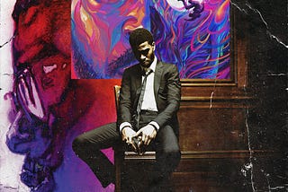 Kid Cudi’s Man on the Moon trilogy album art covers. Cudi is surrounded by the art covers as he sits in a chair, looking down