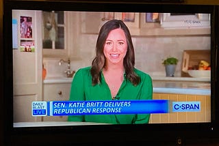 Screen shot of Alabama GOP Senator Katie Britt wearing a green blouse during her rebuttal to President Biden’s State of the Union Address