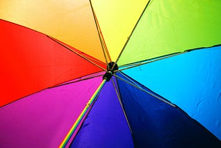 Open Rainbow Umbrella photographed from underneath