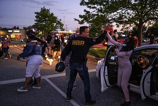 Stop Posting About Cops High-Fiving Protestors