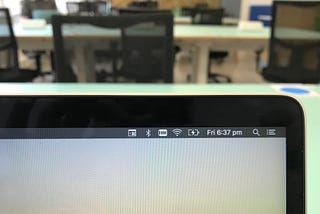Laptop screen showing 6.37pm