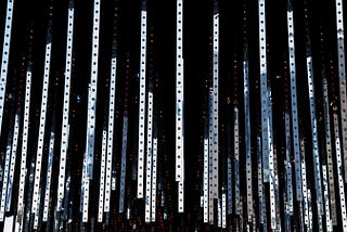A photo of strips of metal dangling from a ceiling, taken in New York City by Justin from MPB