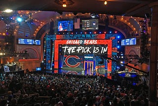 The Chicago Bears, owners of the first pick in the 2024 NFL Draft, are shown making a selection in a previous draft.