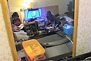 family stuck in motel room