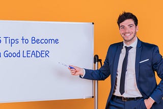 Man pointing at white board