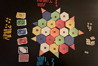 Board game made out of hexagonal colored pieces of paper