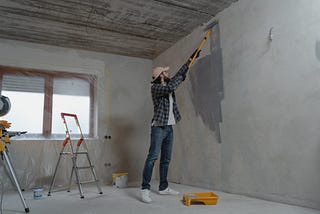 man remodeling a home