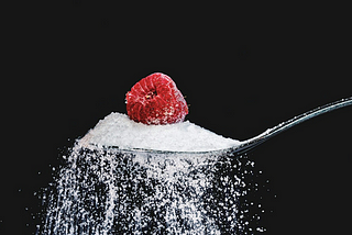 Spoonful of white able sugar