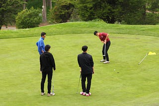 Boys golf co-captains reflect on season after winning Champs on May 14