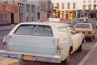 1970s Police Station Wagon parked on a street. Photo by author.
