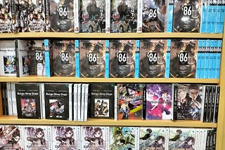 Rows of light novels on the shelves of a Gramedia store.