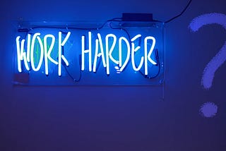 Work harder neon sign | Image adapted from Unsplash | Jordan Whitfield @whitfieldjordan