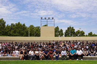A large group shot of facilitators and students of Valley-Bound Commitment sitting at the Greek Theater