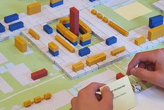 The Planning Game*: How can Lego, Monopoly and War help us make just cities?