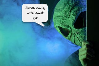 An alien peeking out of a door, saying in a word balloon ‘Gorish Zhivik, with Zhivat Gor’