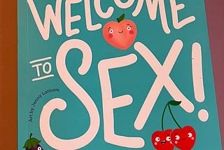 A book with an aqua cover and pictures of fruit. The title says, ‘welcome to sex’
