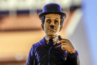 charlie chaplin figure in blue