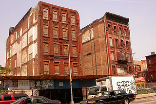 Boarded up buildings in Harlem.